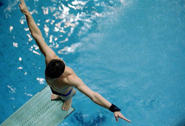 Male diver standing on the board