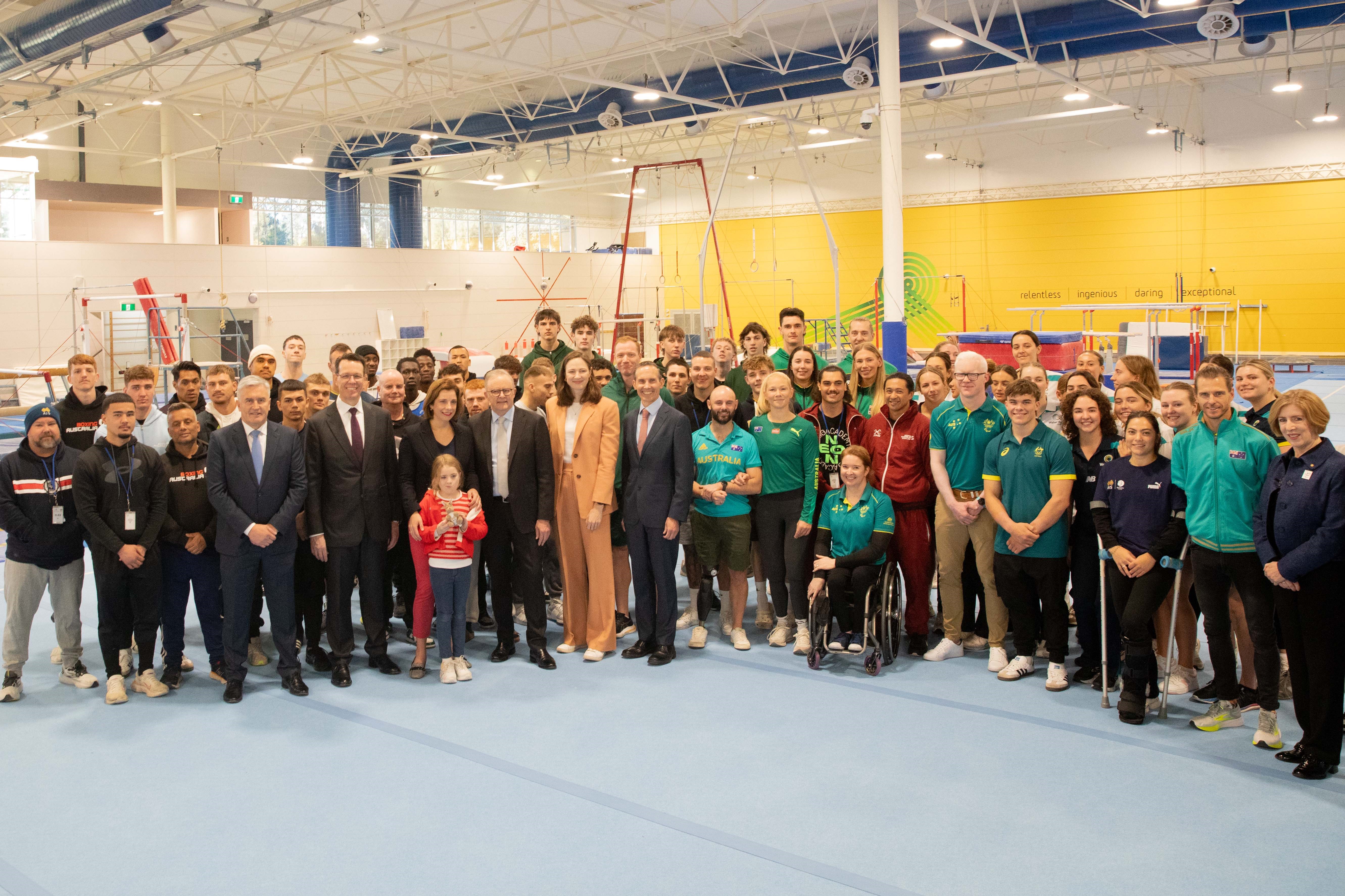 Group photo of athlete with Prime Minister The Hon Anthony Albanese and Minister for Sport, The Hon Anika Wells at the HP Funding Announcement at the Australian Institute of Sport.