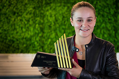 Ash Barty holding a trophy