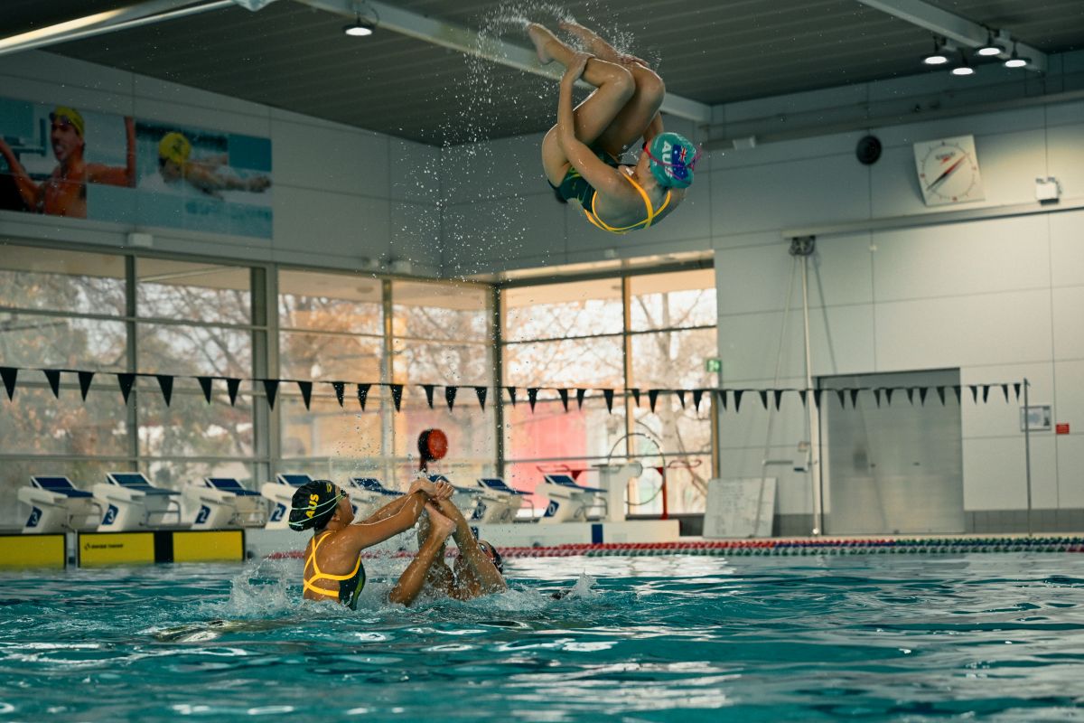 Australia's artistic swimming youth team practicing their World Championships routine in the AIS pool.