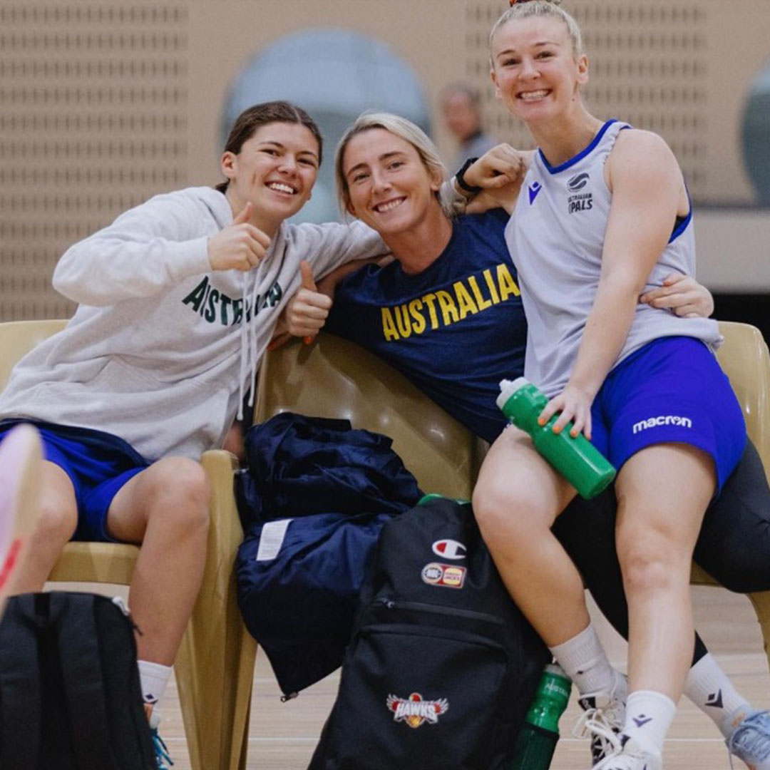 Women smiling at a camera