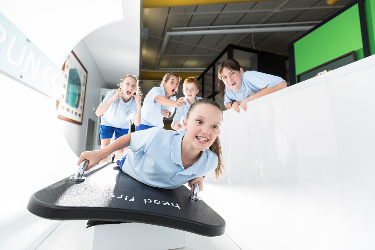 School children enjoying an exhibit at Sportex.